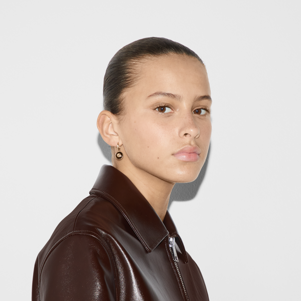 Orecchini a cerchio Gucci Interlocking oro 18k